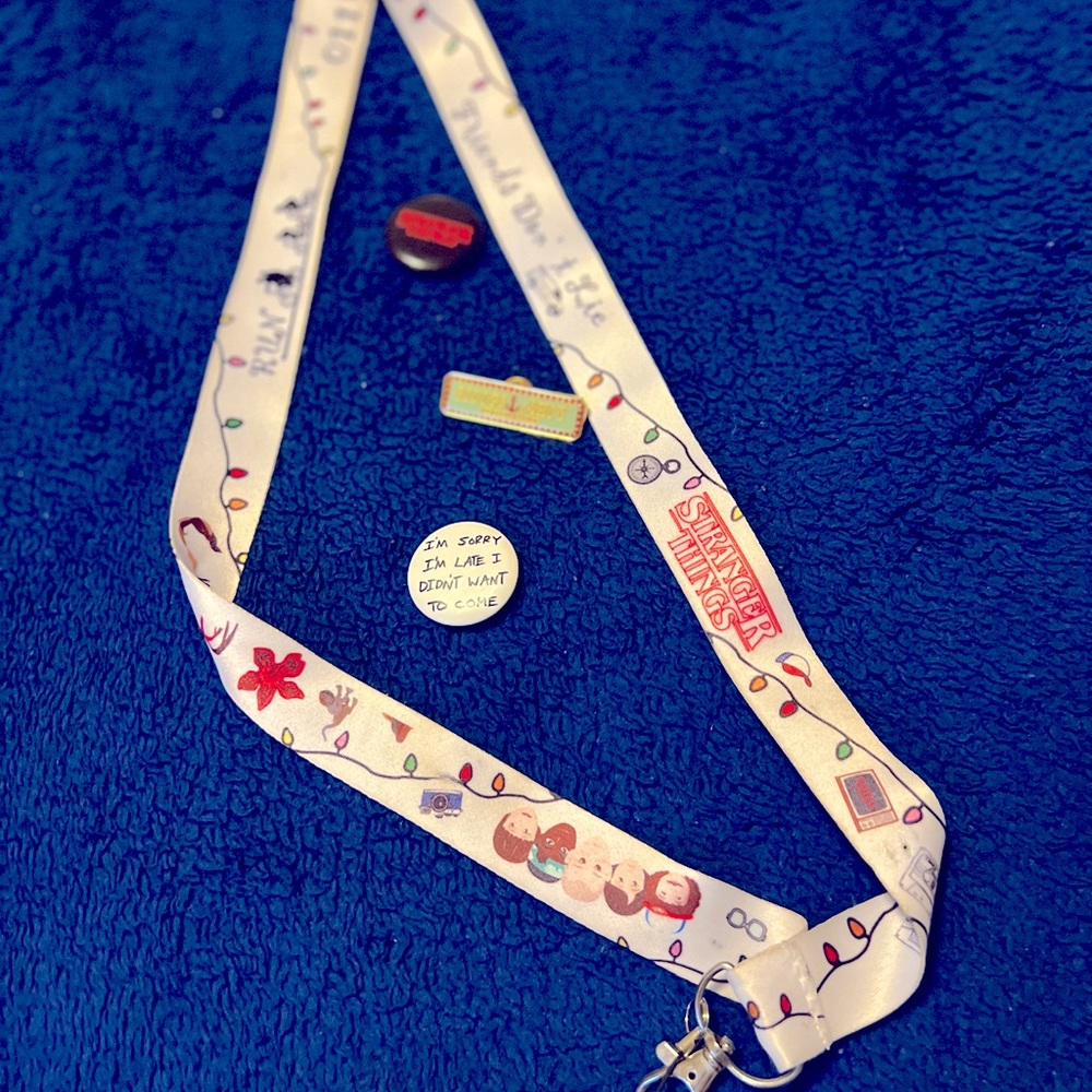 Stranger Things, Hot Topic Lanyard, Friends Don’t Lie, & 3 Stranger Things Pins.